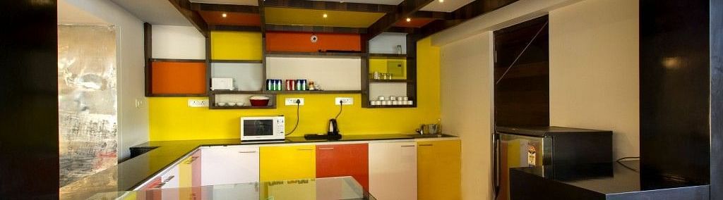 Pantry area with colourful ceiling at Art Boutique Hotel, Hyderabad 