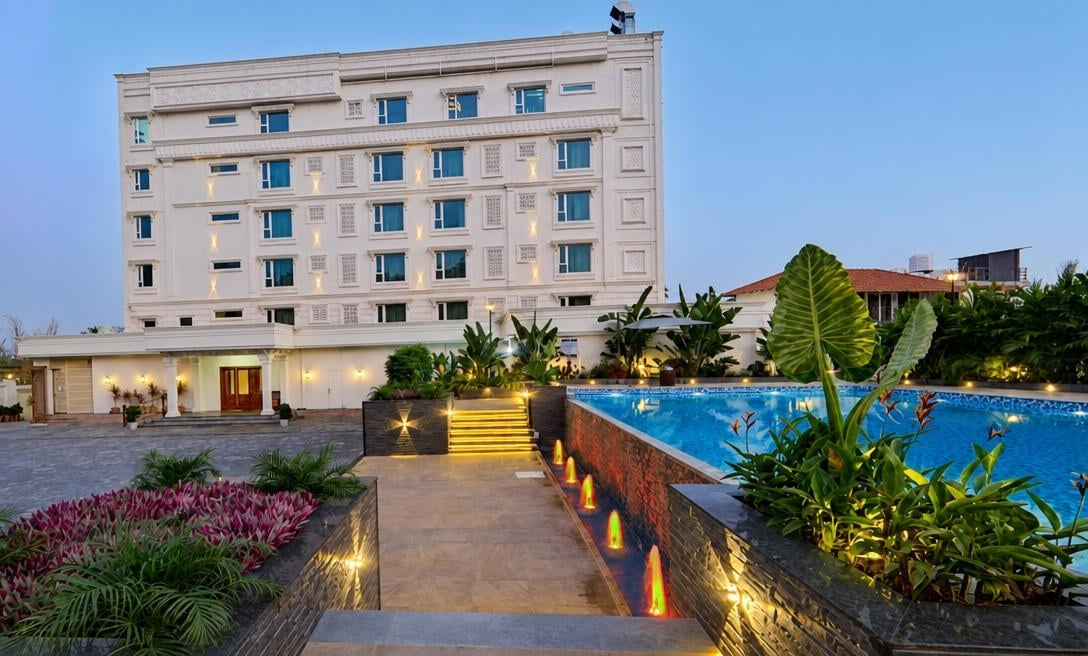 Captains Crown rising above the pool terrace and garden steps