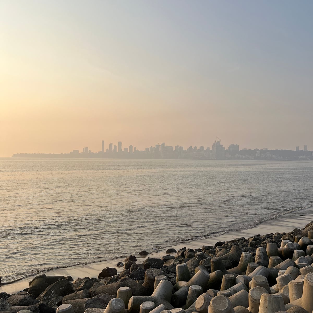 Marine Drive curving along the Arabian Sea at dusk, one of the best places to visit in South Mumbai
