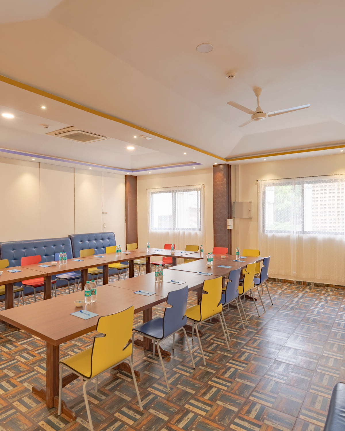 The conference room with its coloured chairs