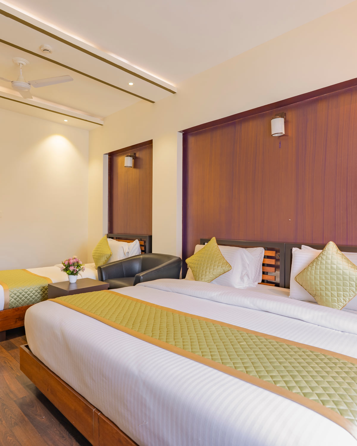 Executive Twin Room with two beds and a wood-panelled wall