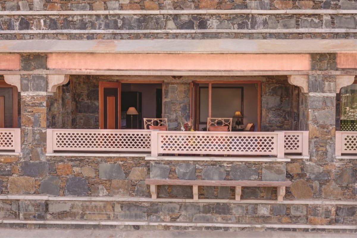 Private sit-outs along the upper veranda of the Super Deluxe wing at Ramada by Wyndham Udaipur Resort and Spa