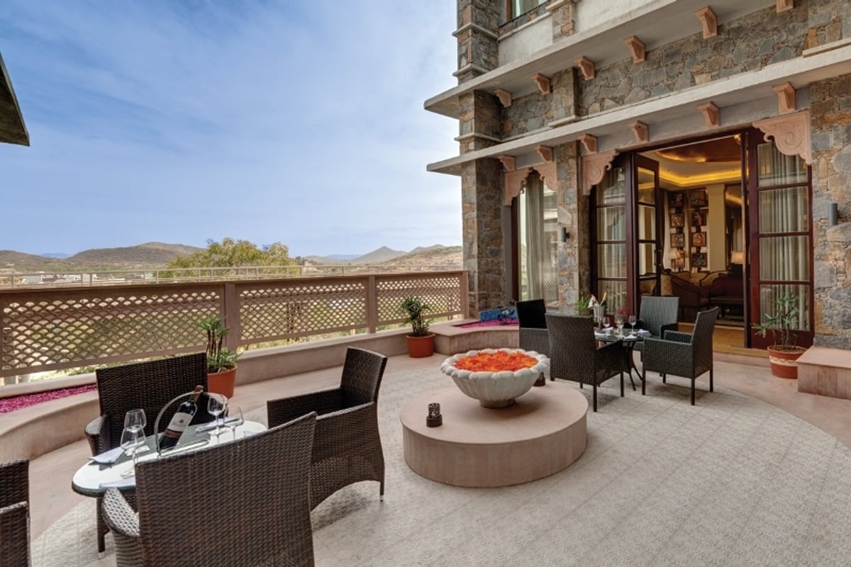 The lotus deck terrace seating at Ramada by Wyndham Udaipur Resort and Spa