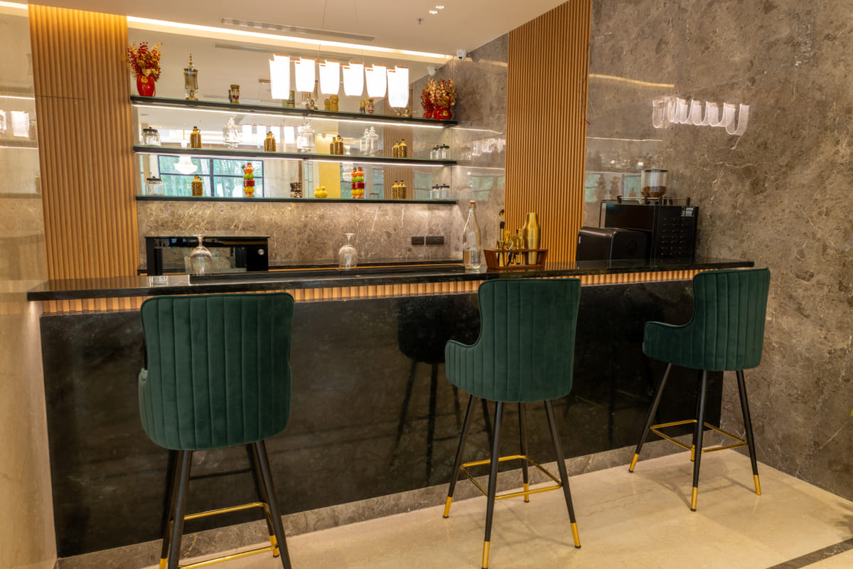 Lobby cafe seating at Triumph Regency OMR Chennai