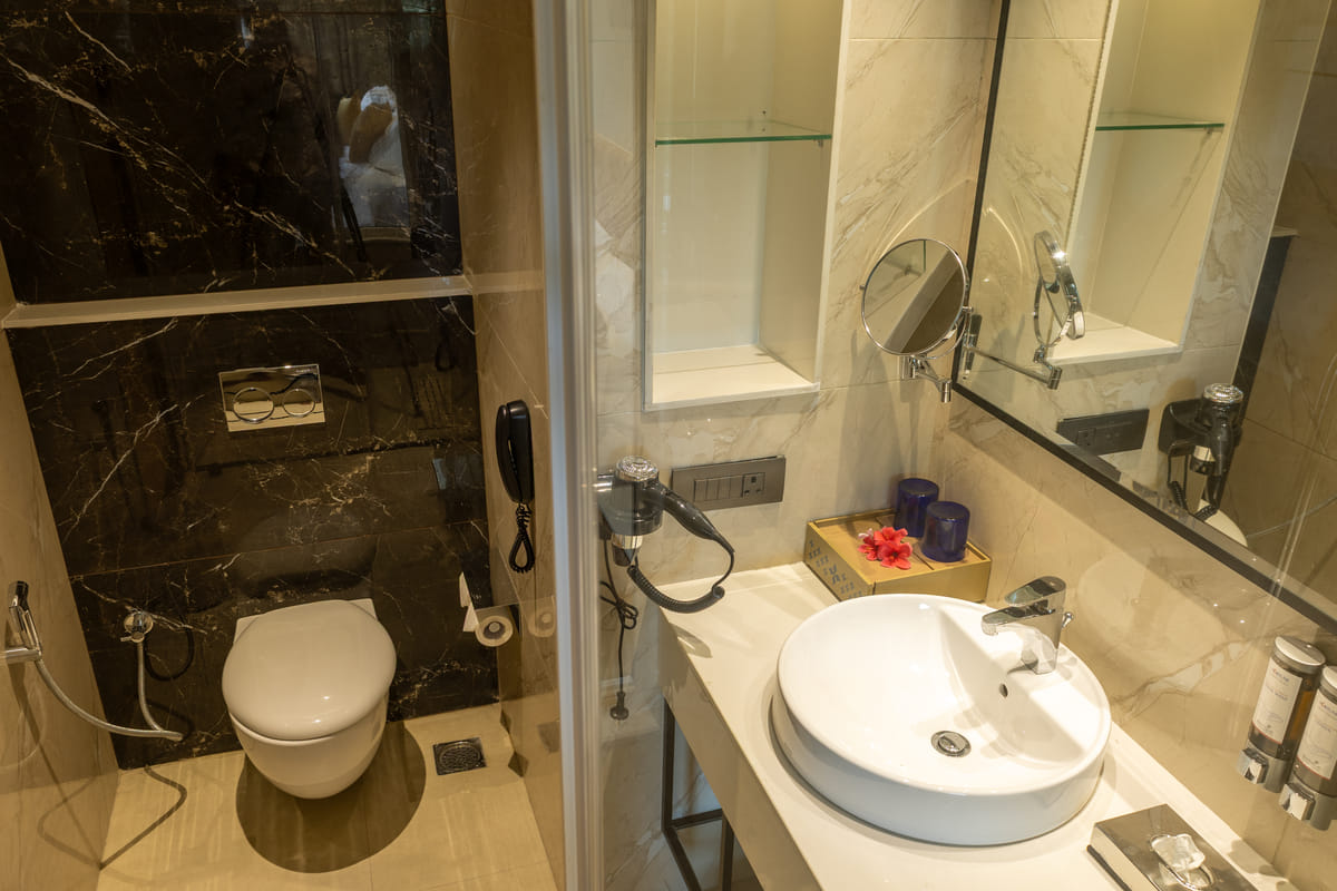 En-suite bathroom with vanity in the Executive King room, OMR Chennai