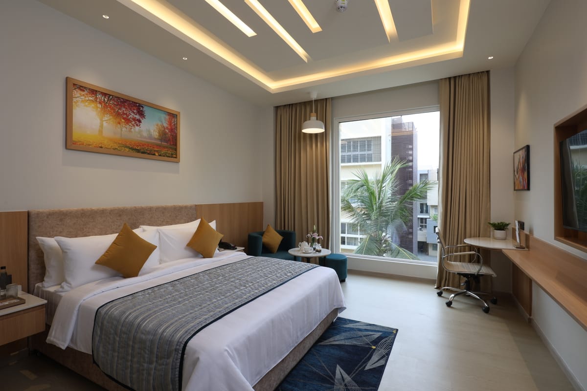 Garden-facing guest room at Triumph Regency OMR Chennai