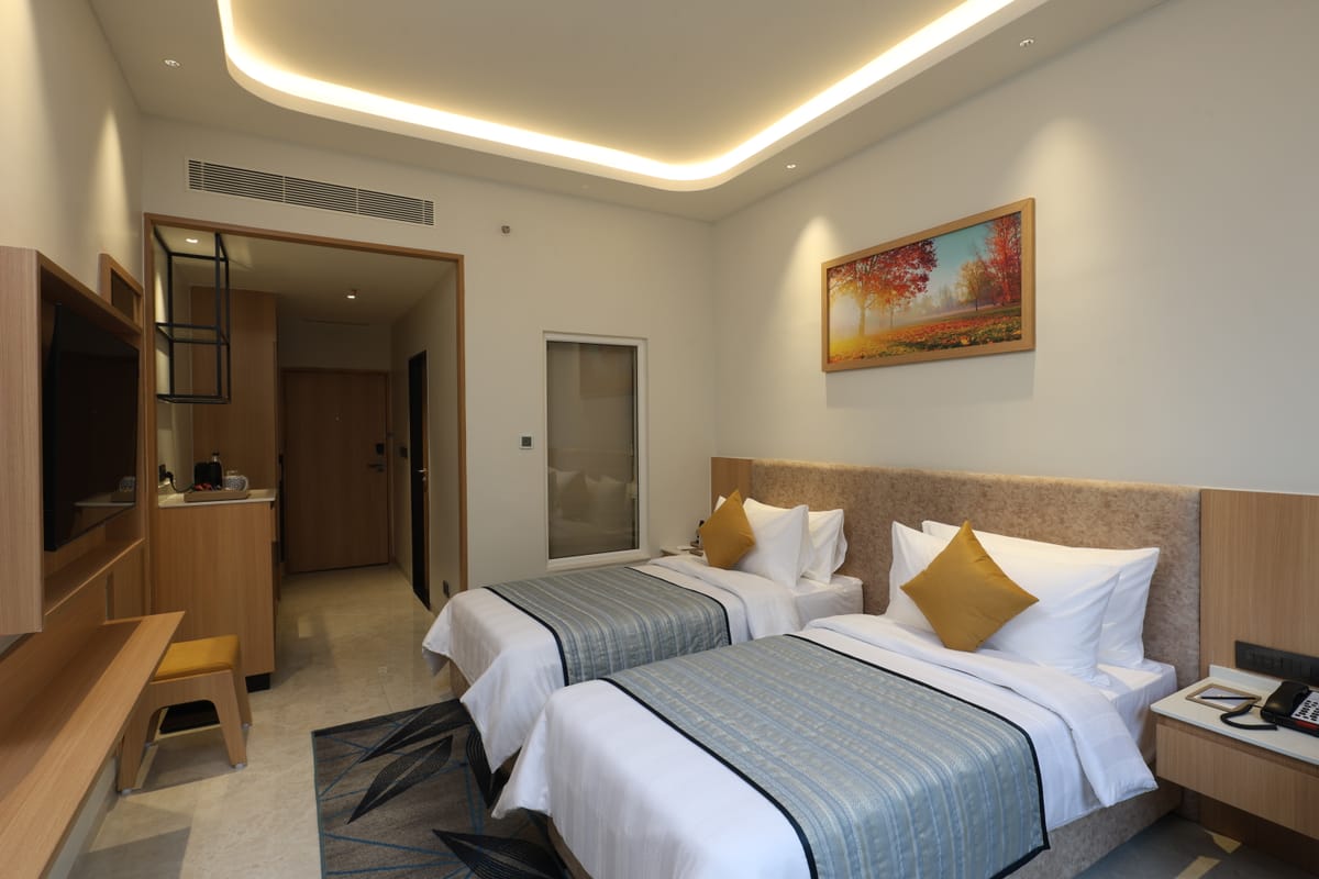 Twin-bedded Executive Twin room at Triumph Regency OMR Chennai