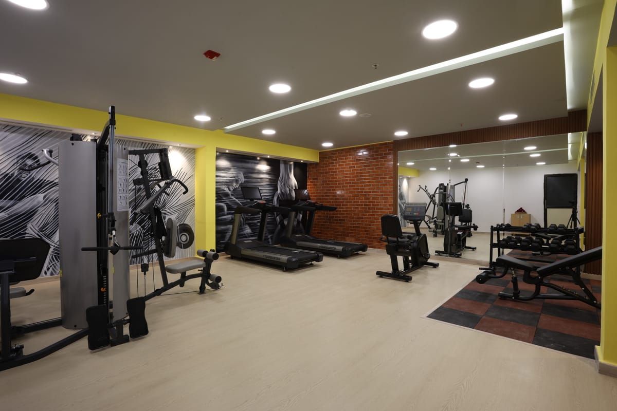 Cardio and weights in the fitness centre at Triumph Regency OMR Chennai