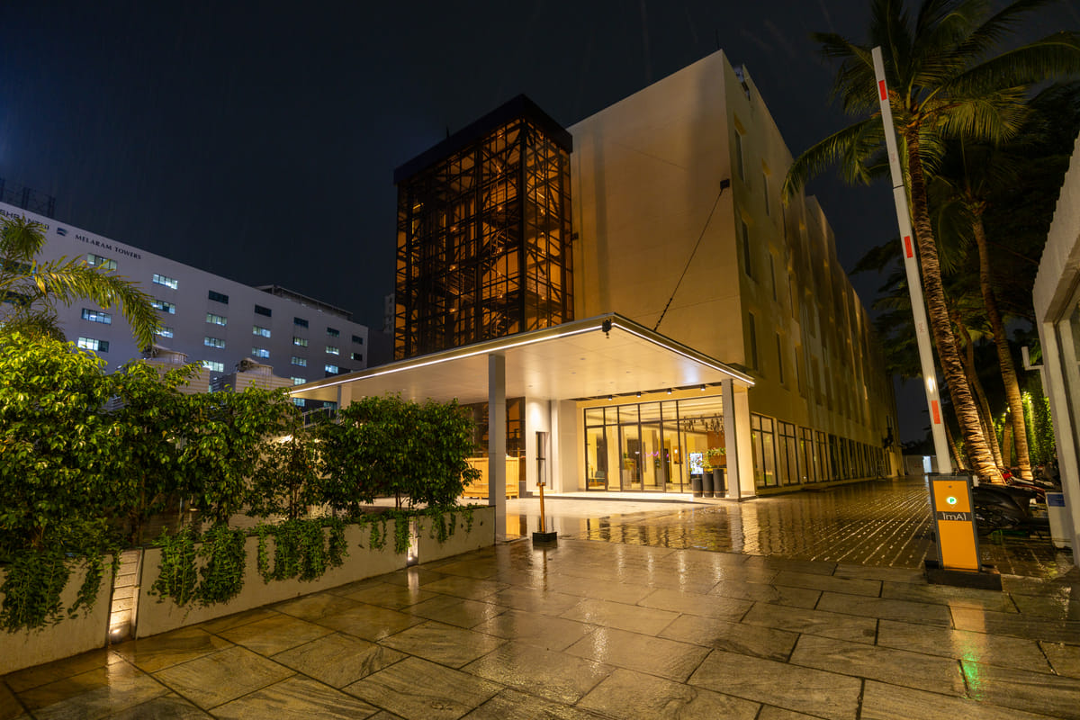 Triumph Regency OMR Chennai facade lit at night