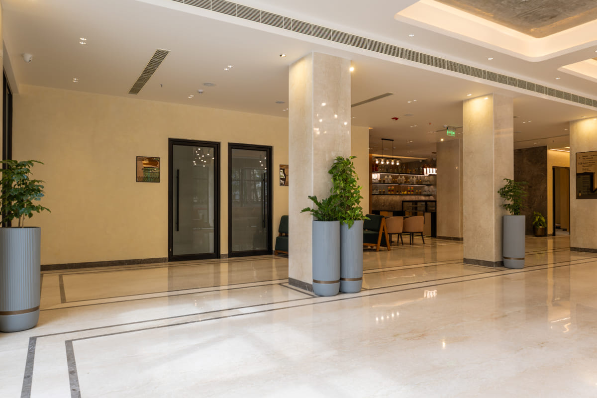 Open lobby seating at Triumph Regency OMR Chennai