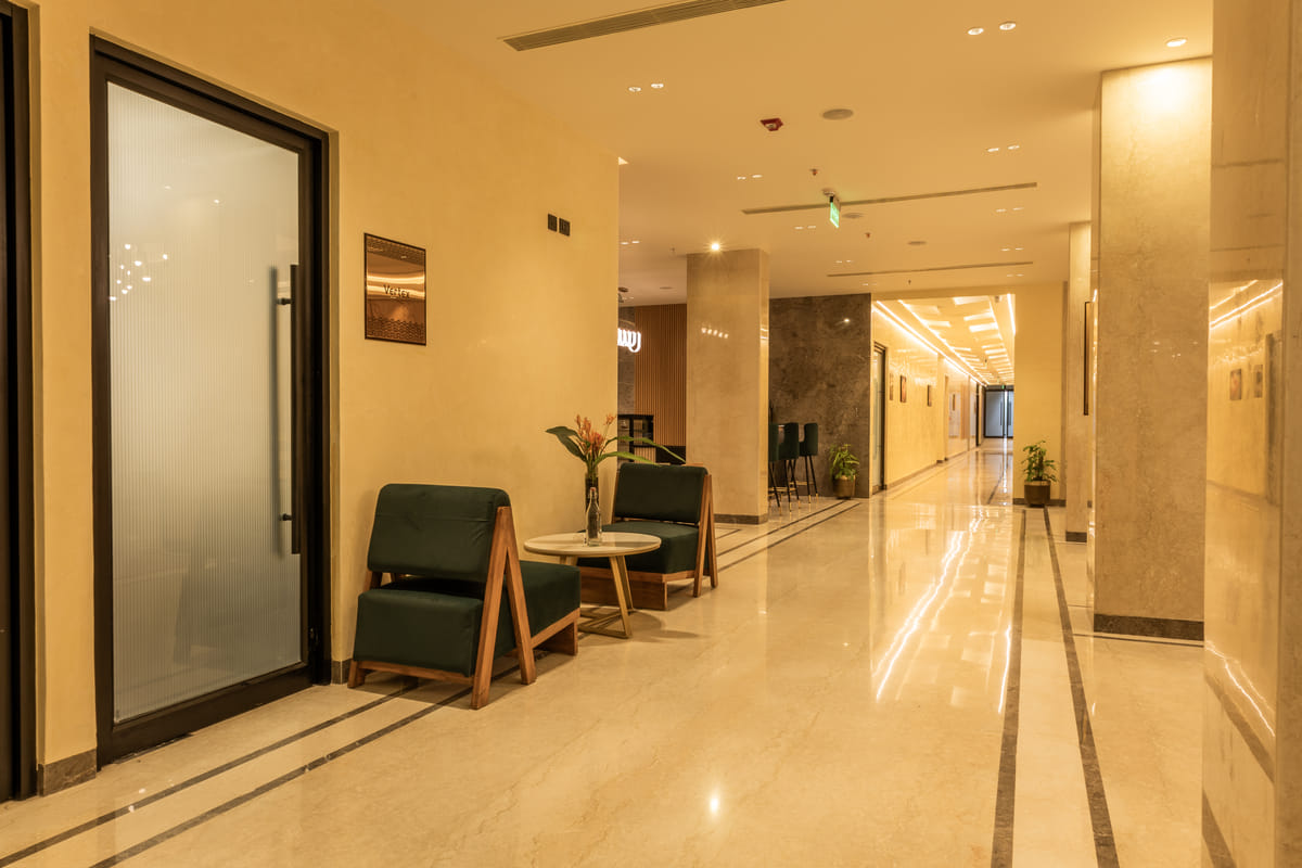Corridor off the lobby at Triumph Regency OMR Chennai