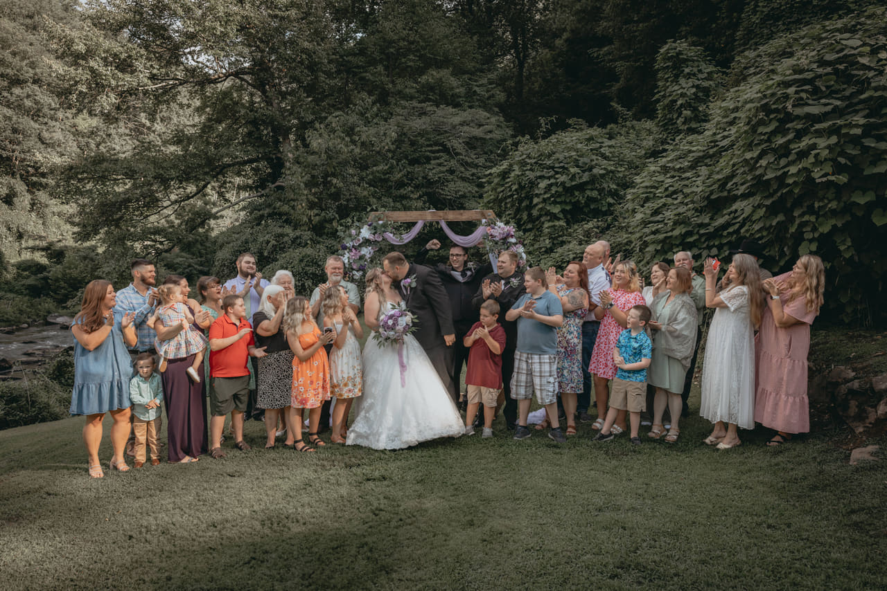 A wedding celebration beside the Cheoah River at Historic Tapoco Lodge in the Great Smoky Mountains