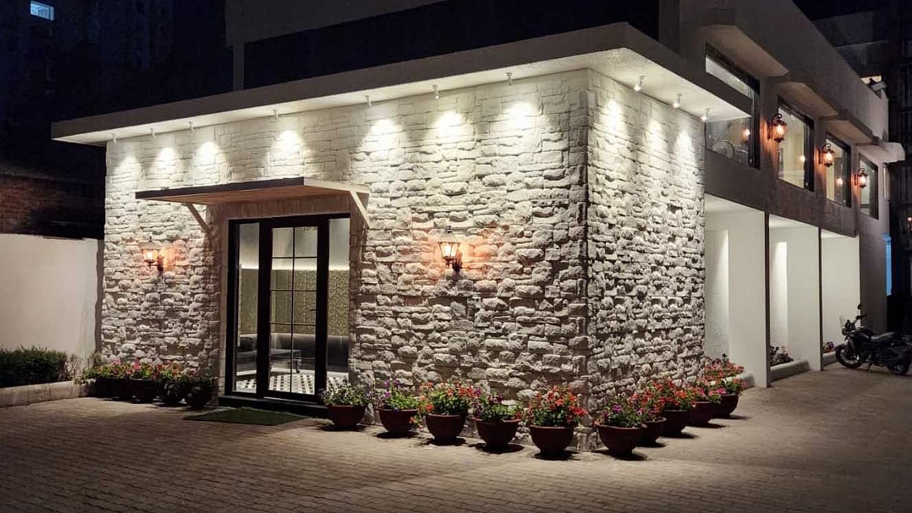 Outside view of Sizller in the night - The Cindrella Hotel, Siliguri