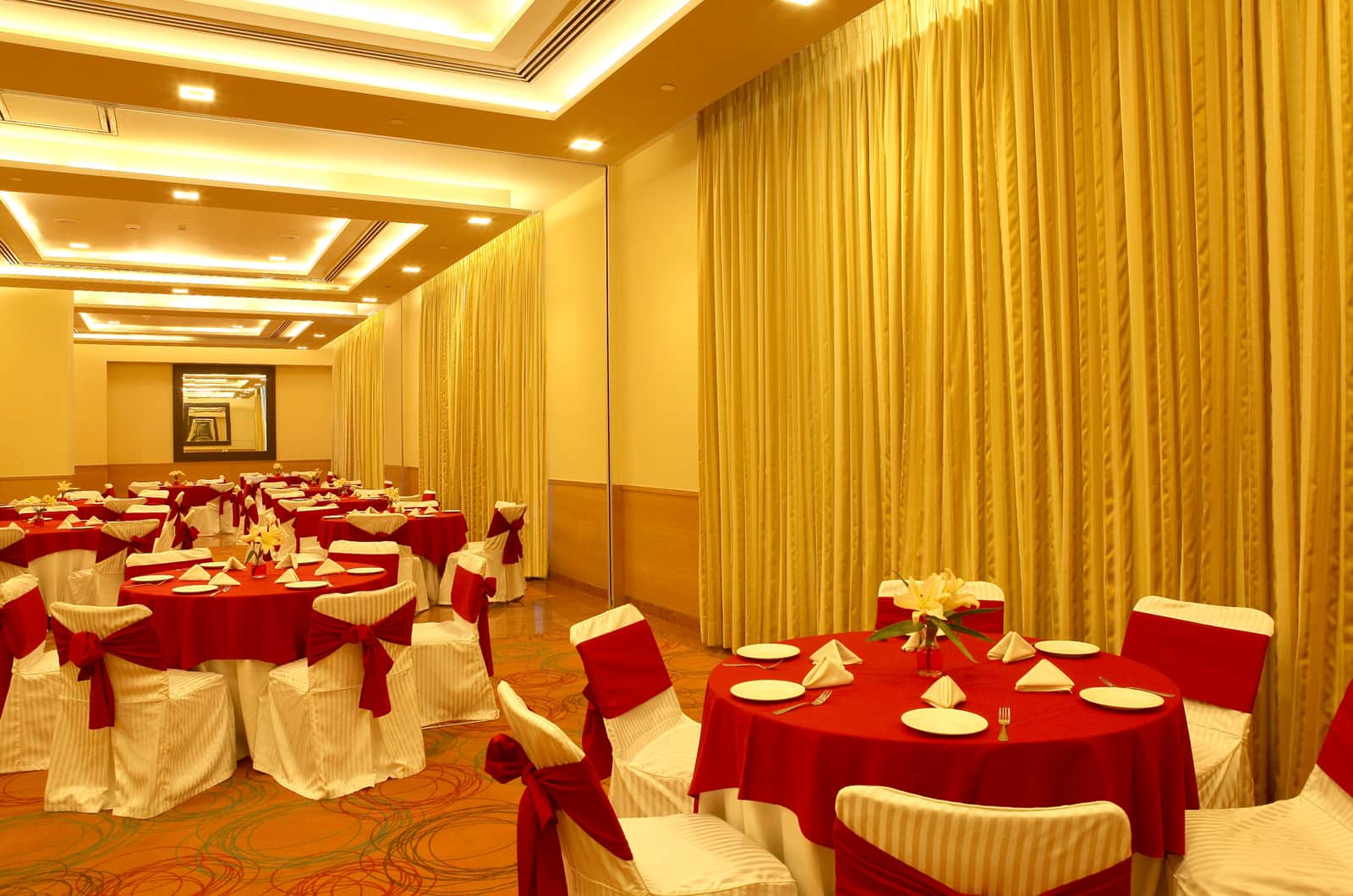 Conclave dressed in red and gold for a function