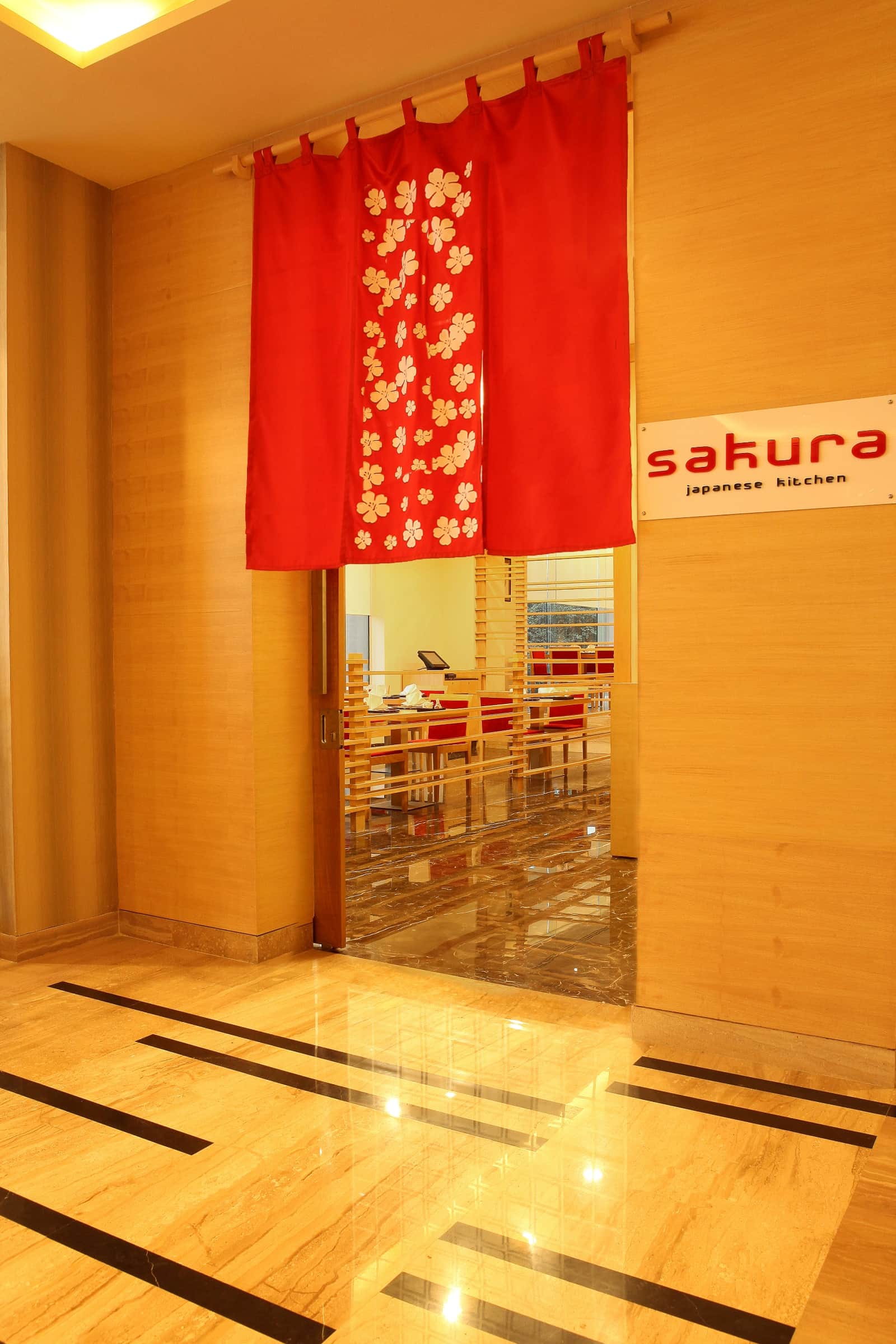 The entrance to Sakura, under its red noren banners