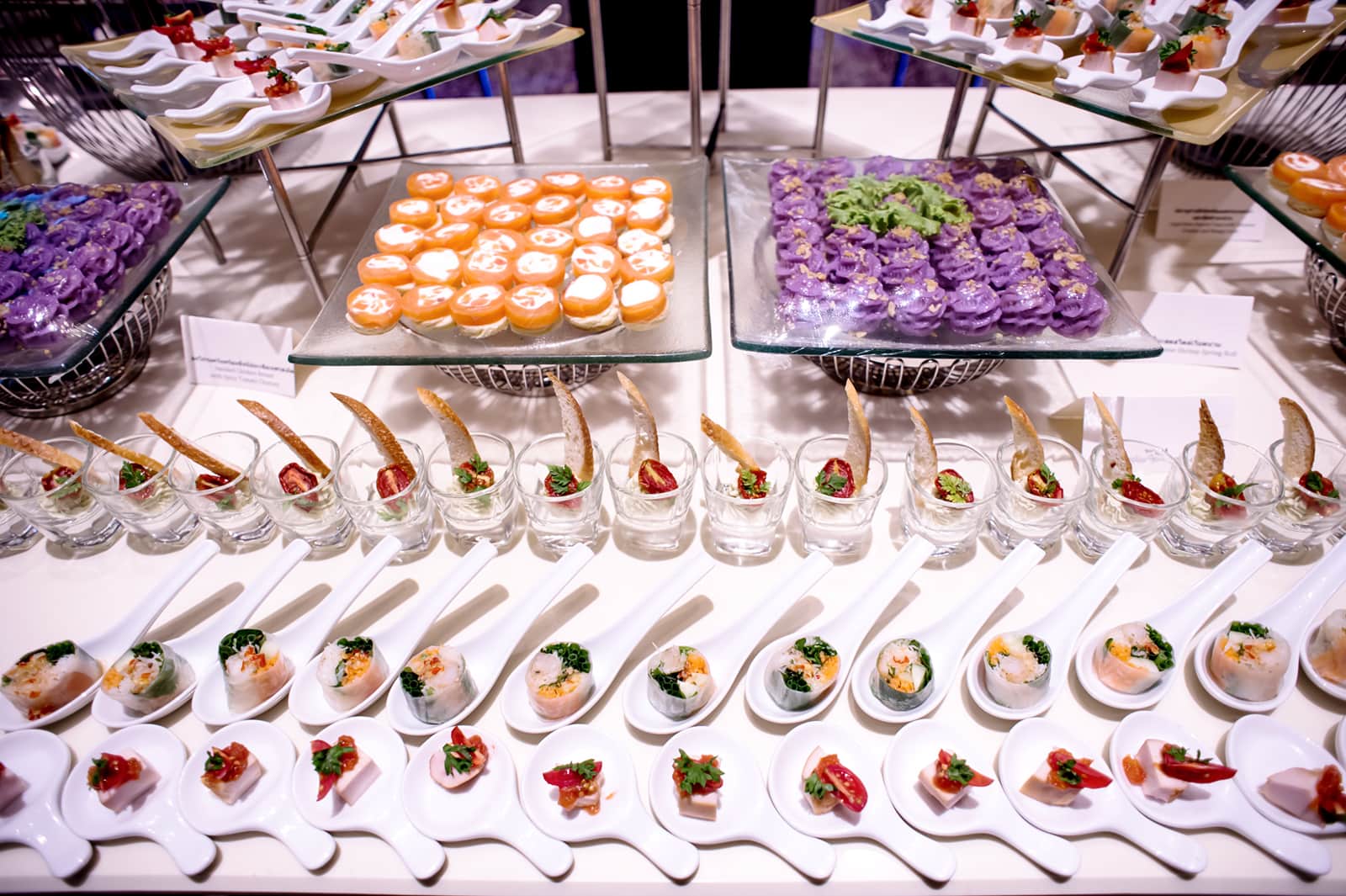 Finger food laid out on a buffet table