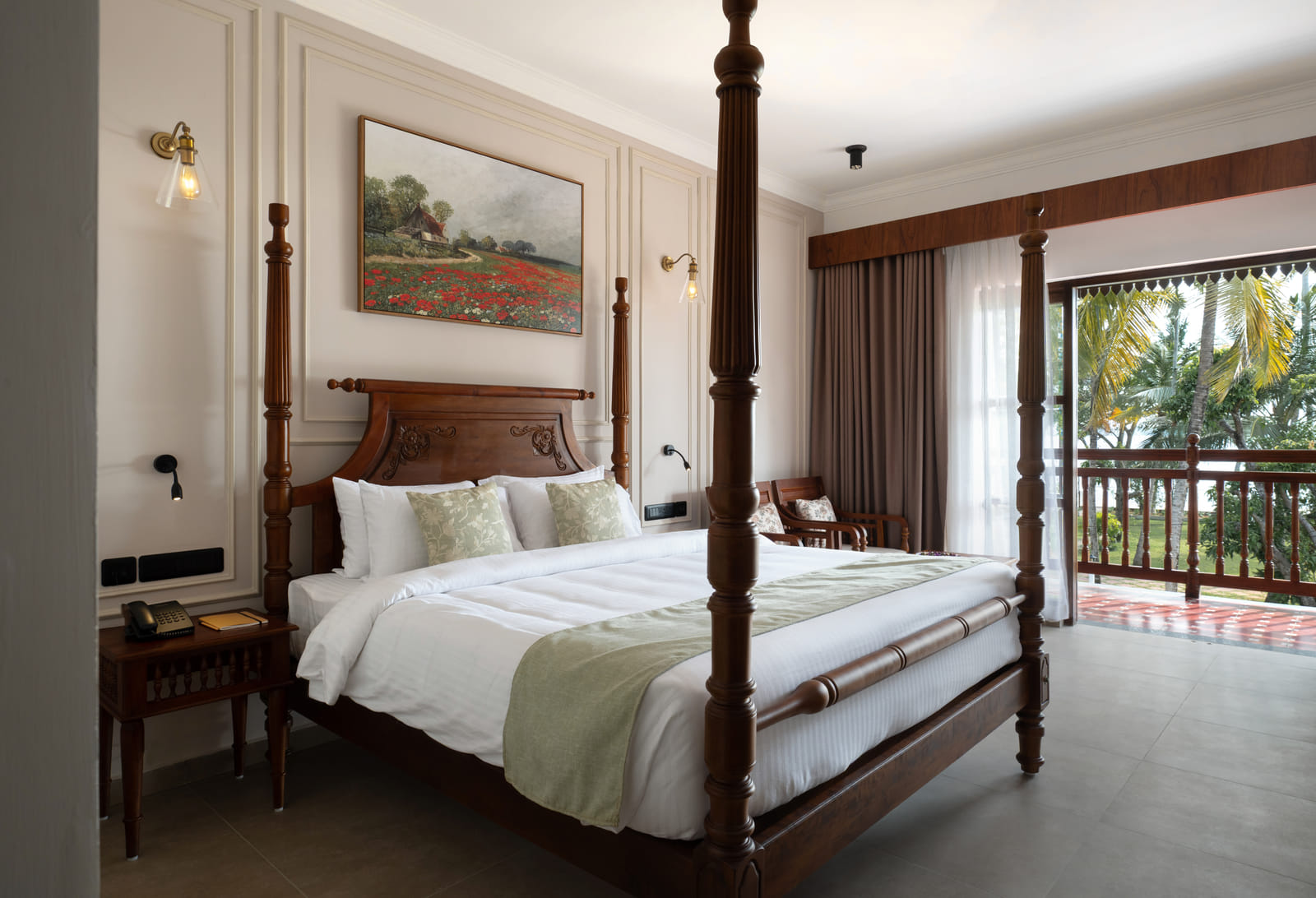 King bed and balcony with a direct view of Vembanad Lake in the Lake View Room at Sanskreti, Kochi