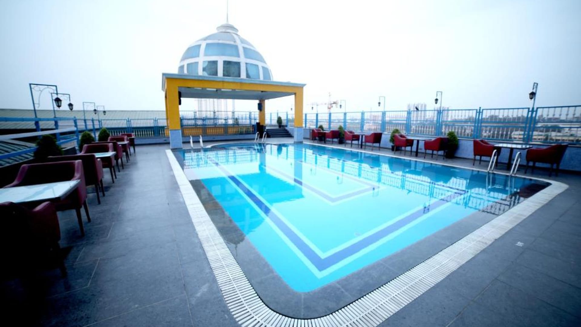 Pool area at RG Royal Hotel & Convention, Bengaluru