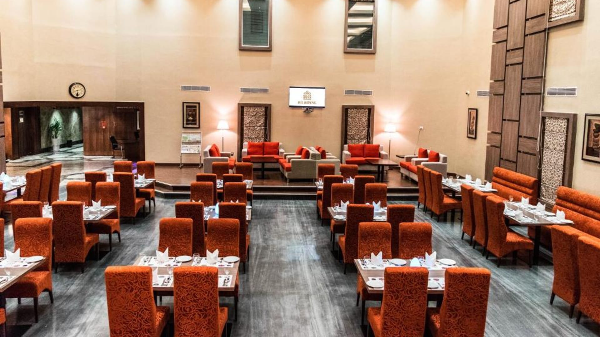 Maxims multi-cuisine restaurant dining area at RG Royal Hotel & Convention, Bengaluru