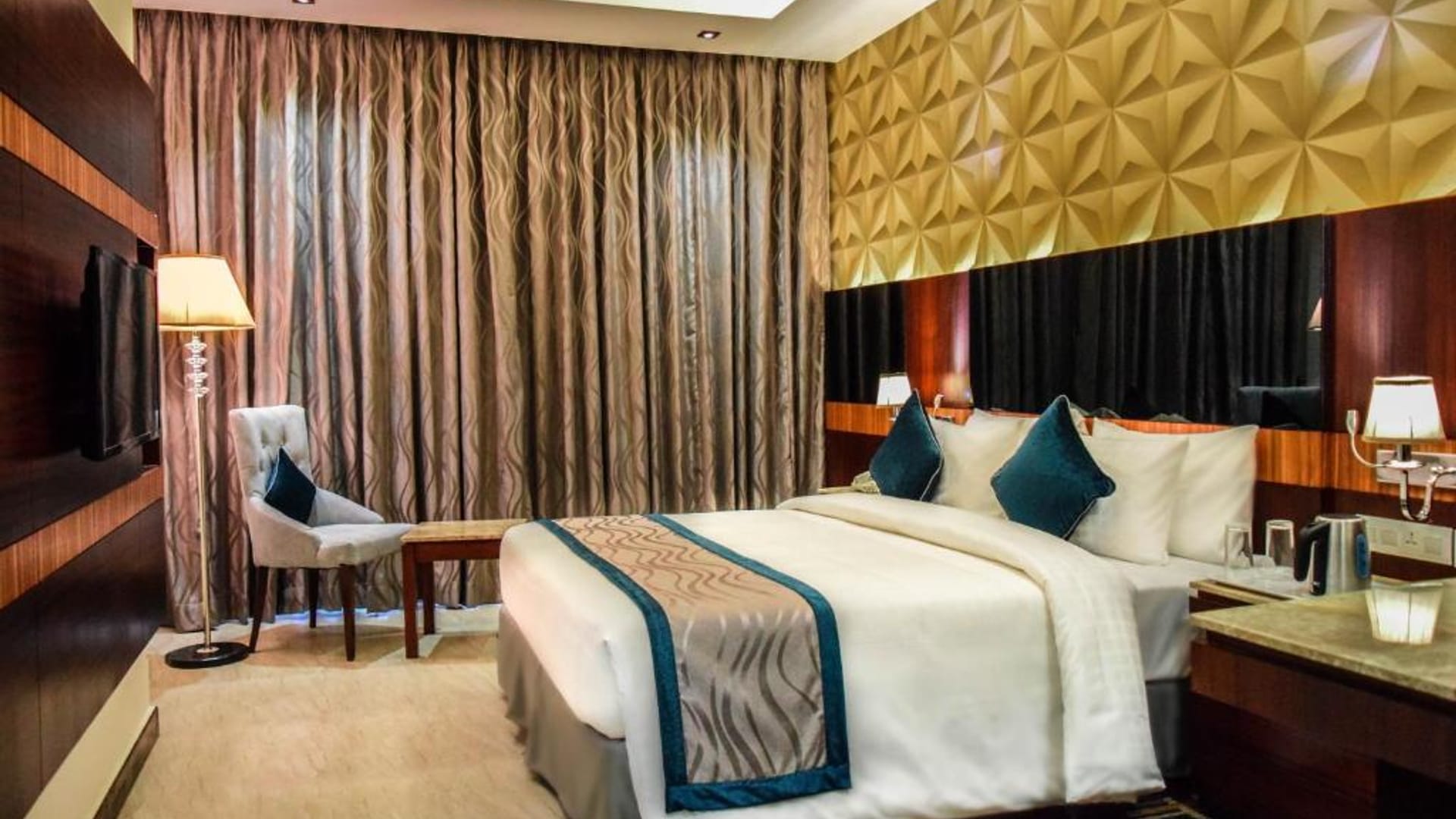 Standard guest room interior at RG Royal Hotel & Convention, Bengaluru