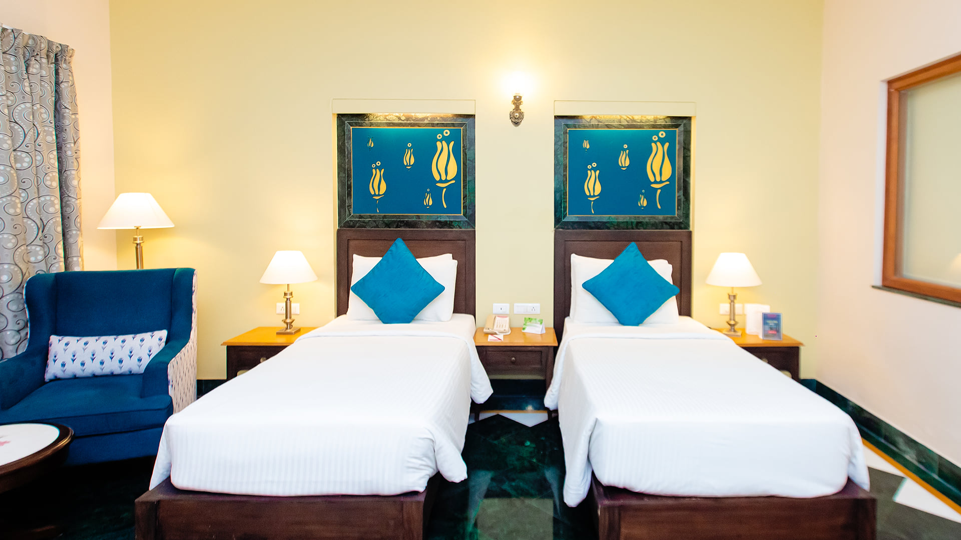 Deluxe Room with twin beds at Ramada by Wyndham Udaipur Resort and Spa
