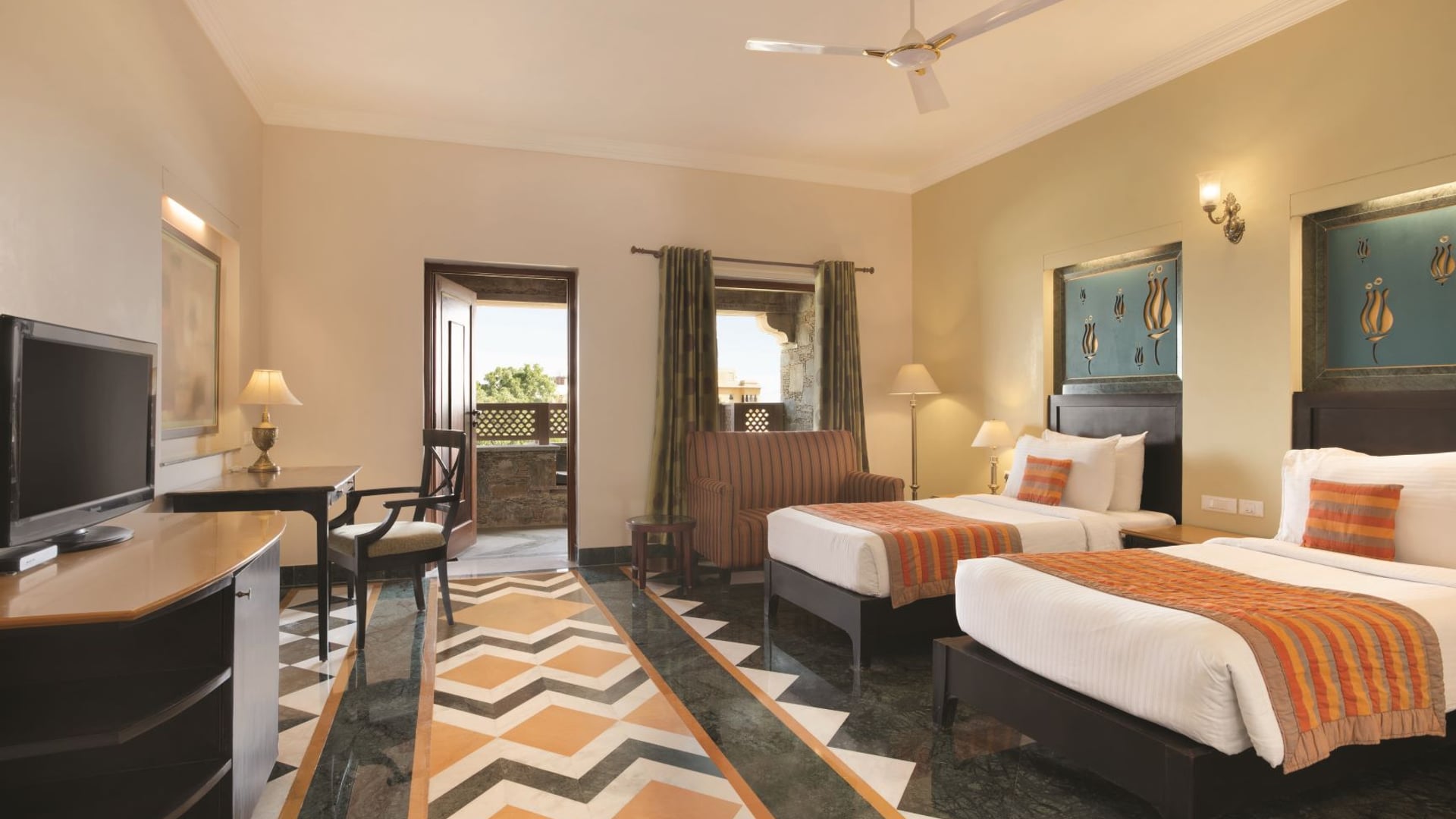 Super Deluxe Room with twin beds at Ramada by Wyndham Udaipur Resort and Spa