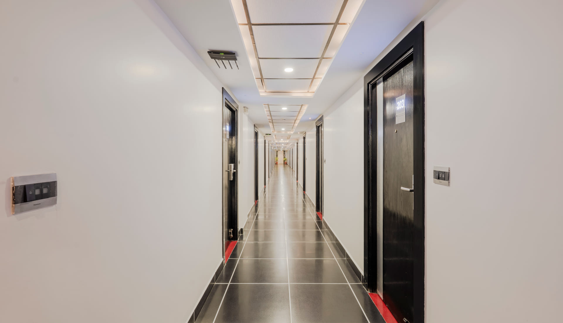 Guest-room corridor at RD Hotels, HSR Layout