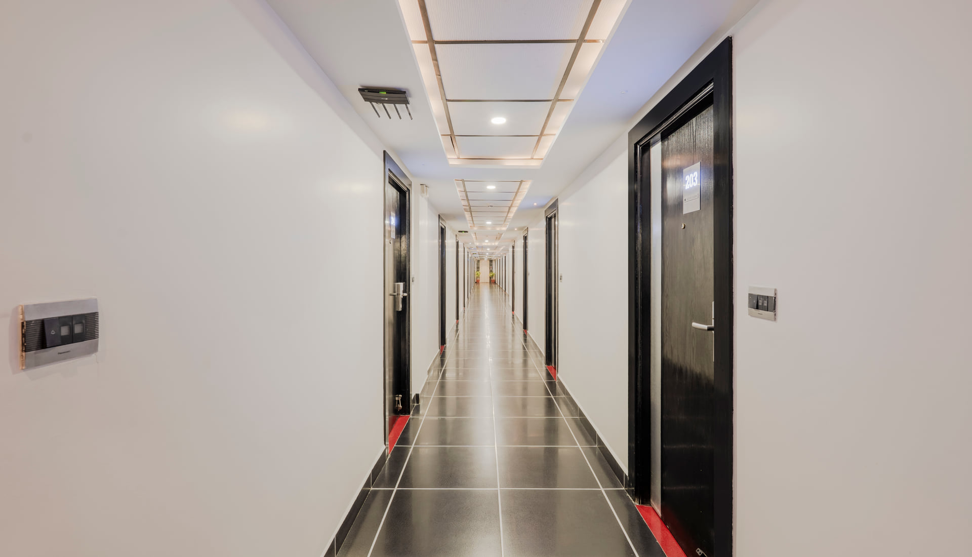 Guest-room corridor at RD Hotels, HSR Layout