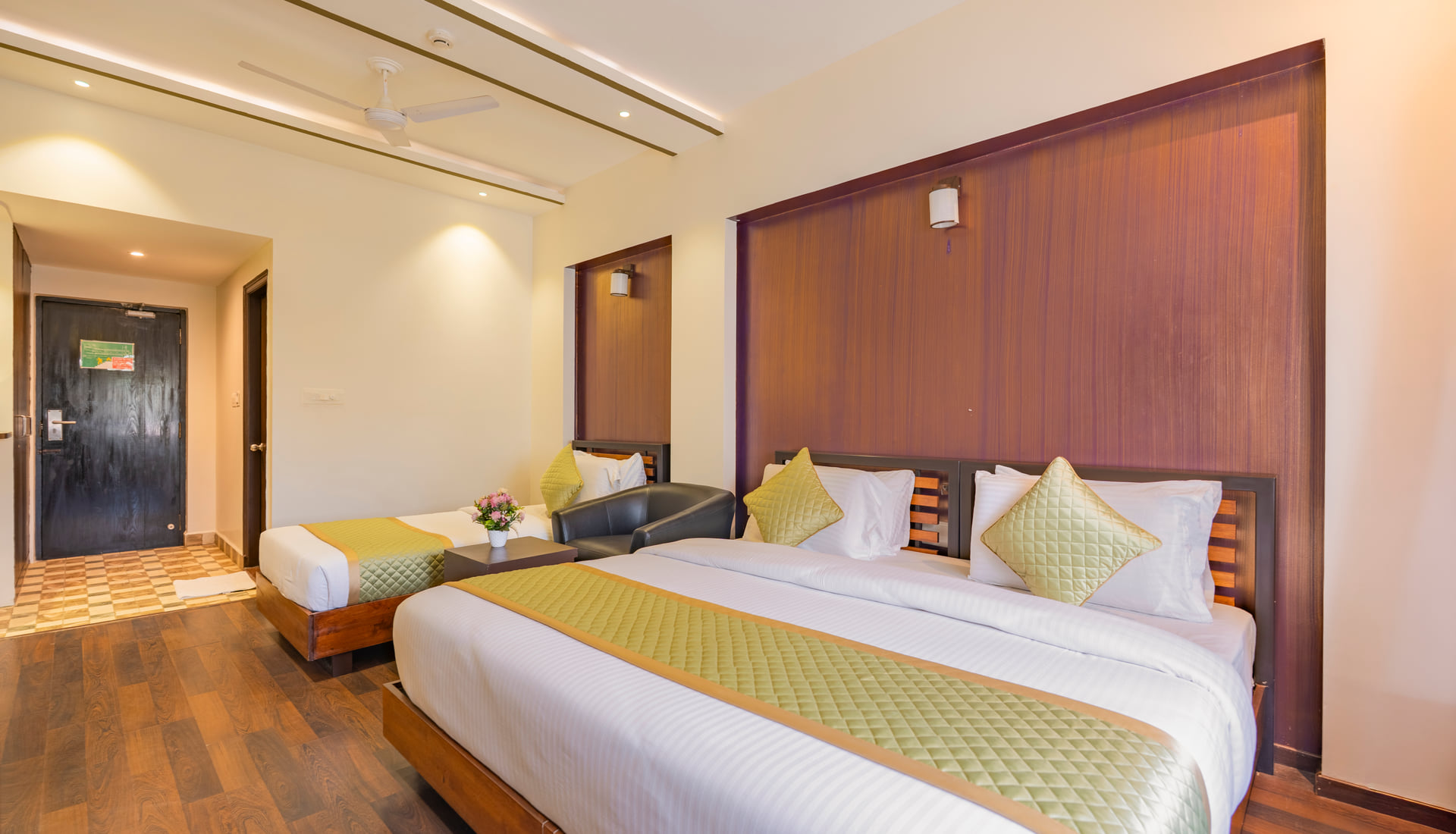 Executive Twin Room with two beds and a wood-panelled wall