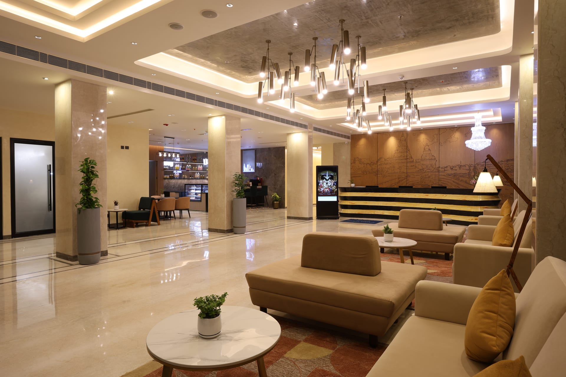 Comfortable lounge seating in the lobby at Triumph Regency OMR Chennai