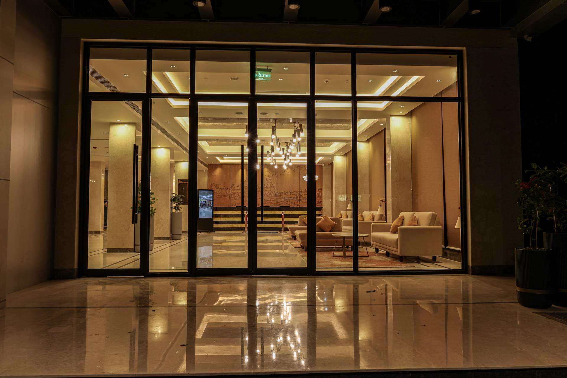 Guests arriving at the lobby entrance of Triumph Regency OMR Chennai