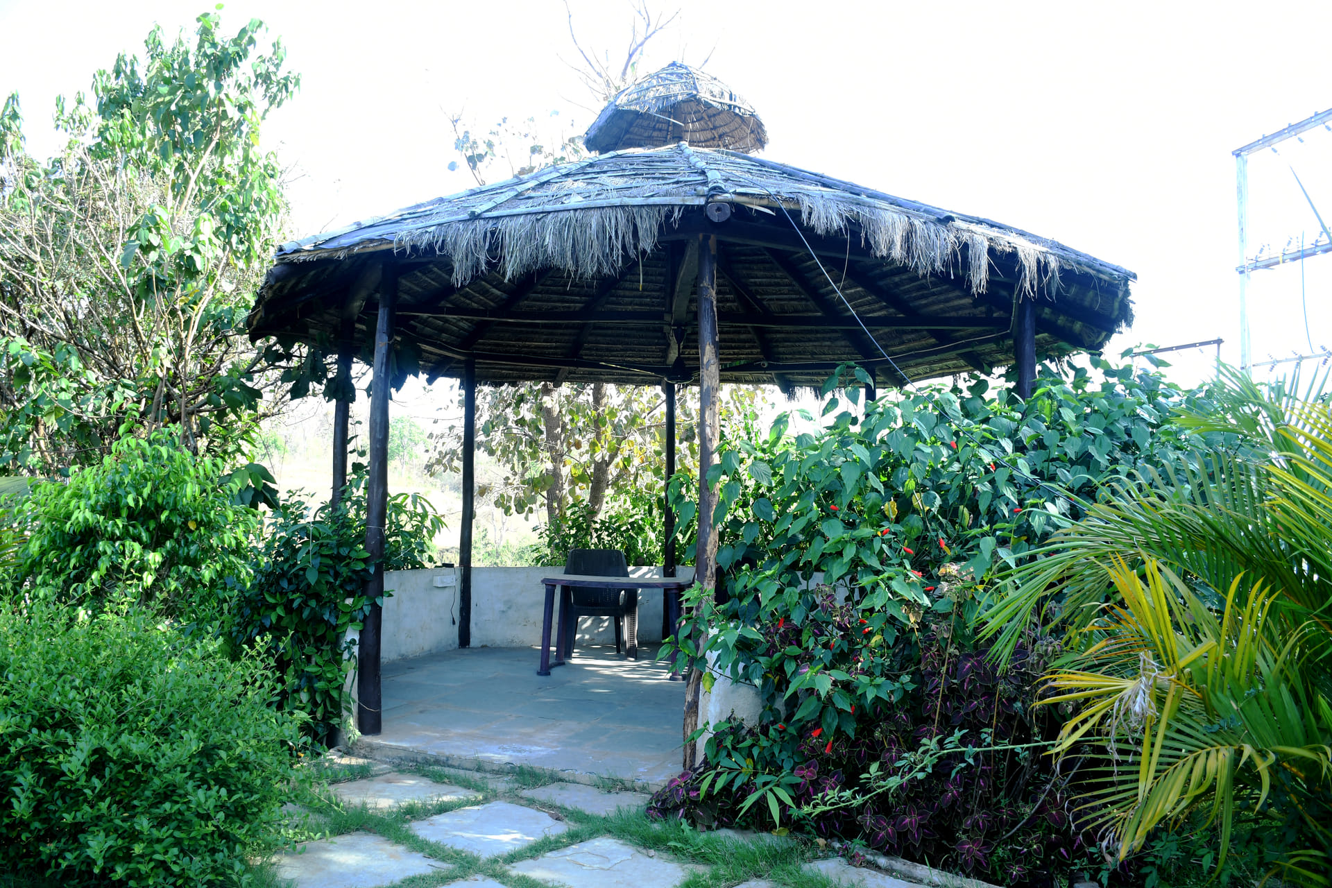 Open-air gazebo dining by the Denwa river