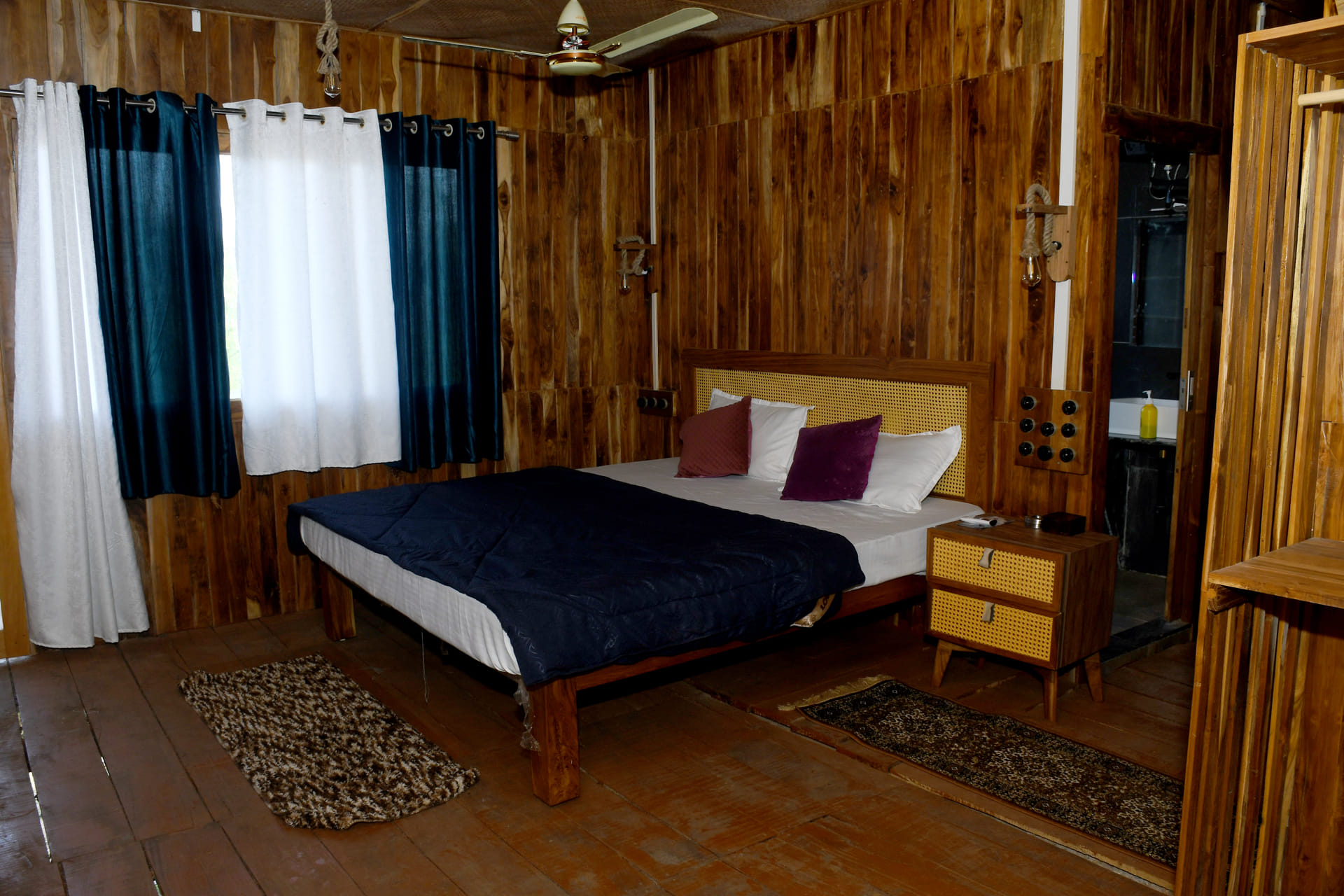 Teak-panelled interior of the Wooden Villa