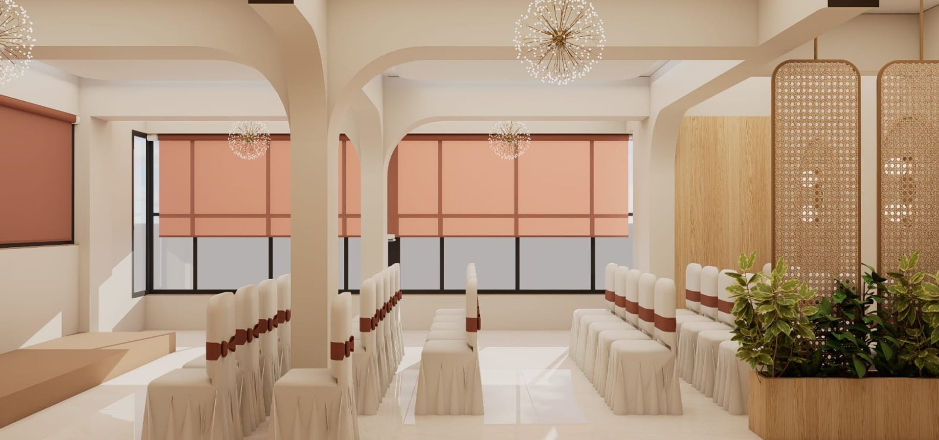 Coral banquet hall with draped chairs set in rows between arched pillars | Shirgaonkar Beach Resort