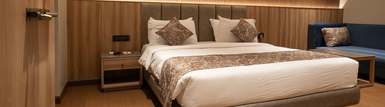 front view of the double bed inside super deluxe room - The Cindrella Hotel, Siliguri