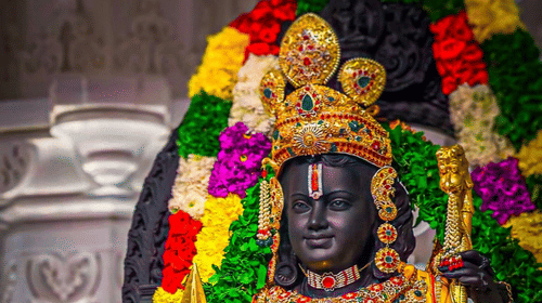Statue of Lord Rama adorned with flowers and jewellery.