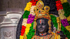 Statue of Lord Rama adorned with flowers and jewellery.