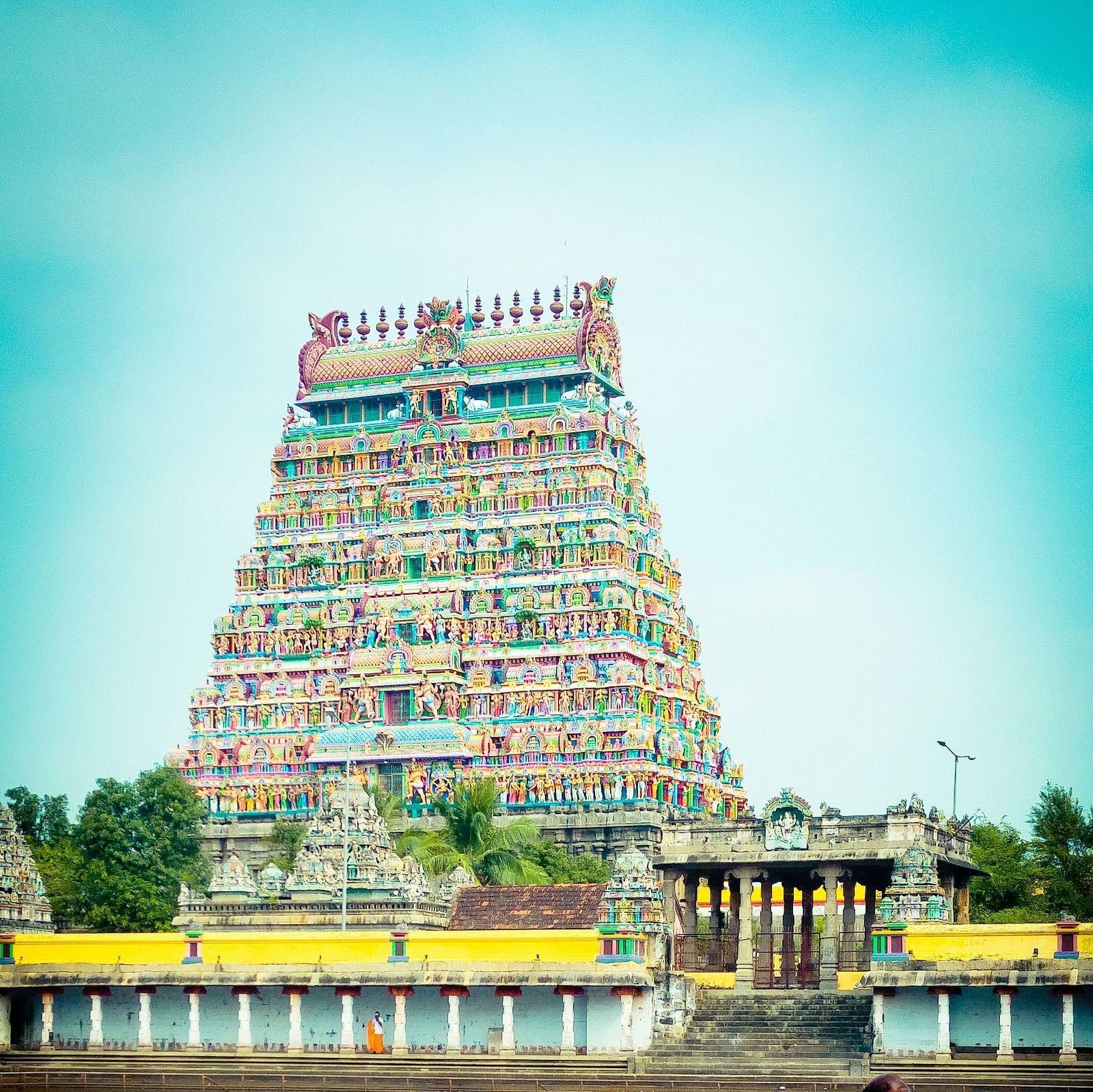 a temple reflected on a water body