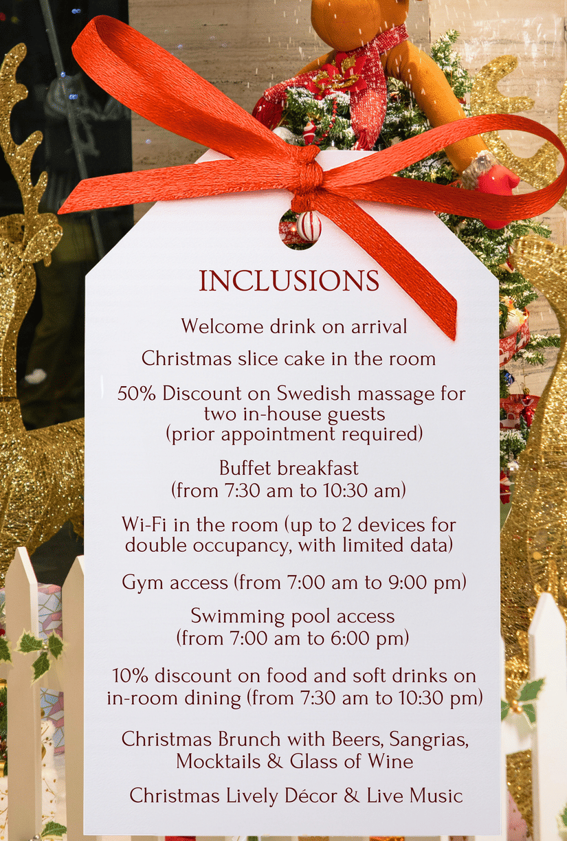 The Festive Christmas package inclusions tag with reindeer decoration at The Empresa Hotel, featuring welcome drink, cake, spa and brunch benefits.