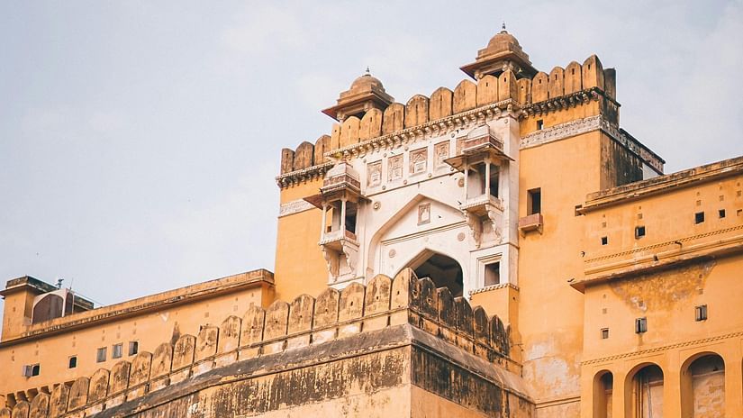 A staircase leading to the entry of a fort on an overcast day