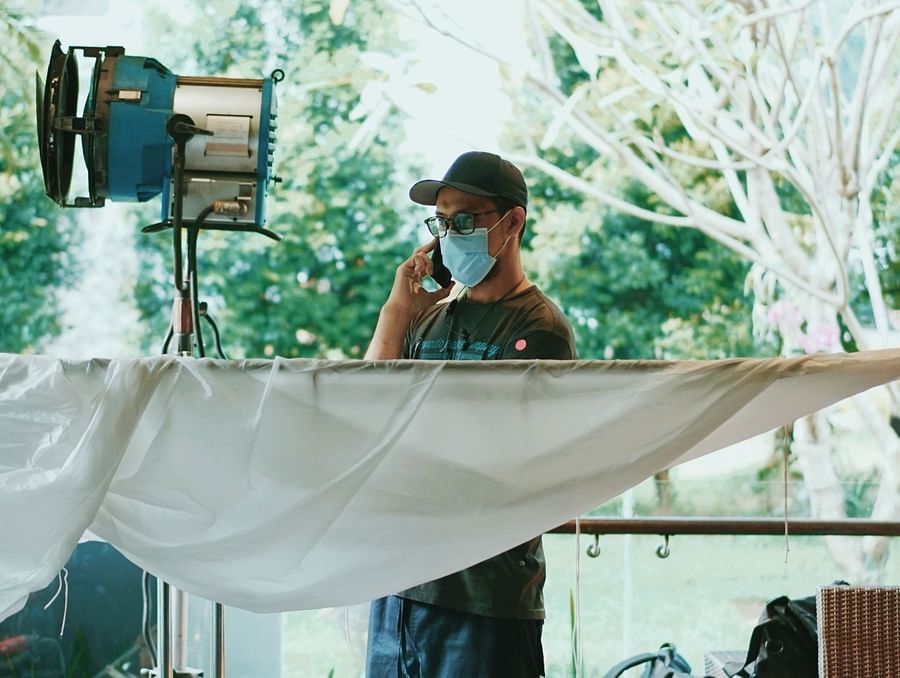 woman organising a brand shoot setup