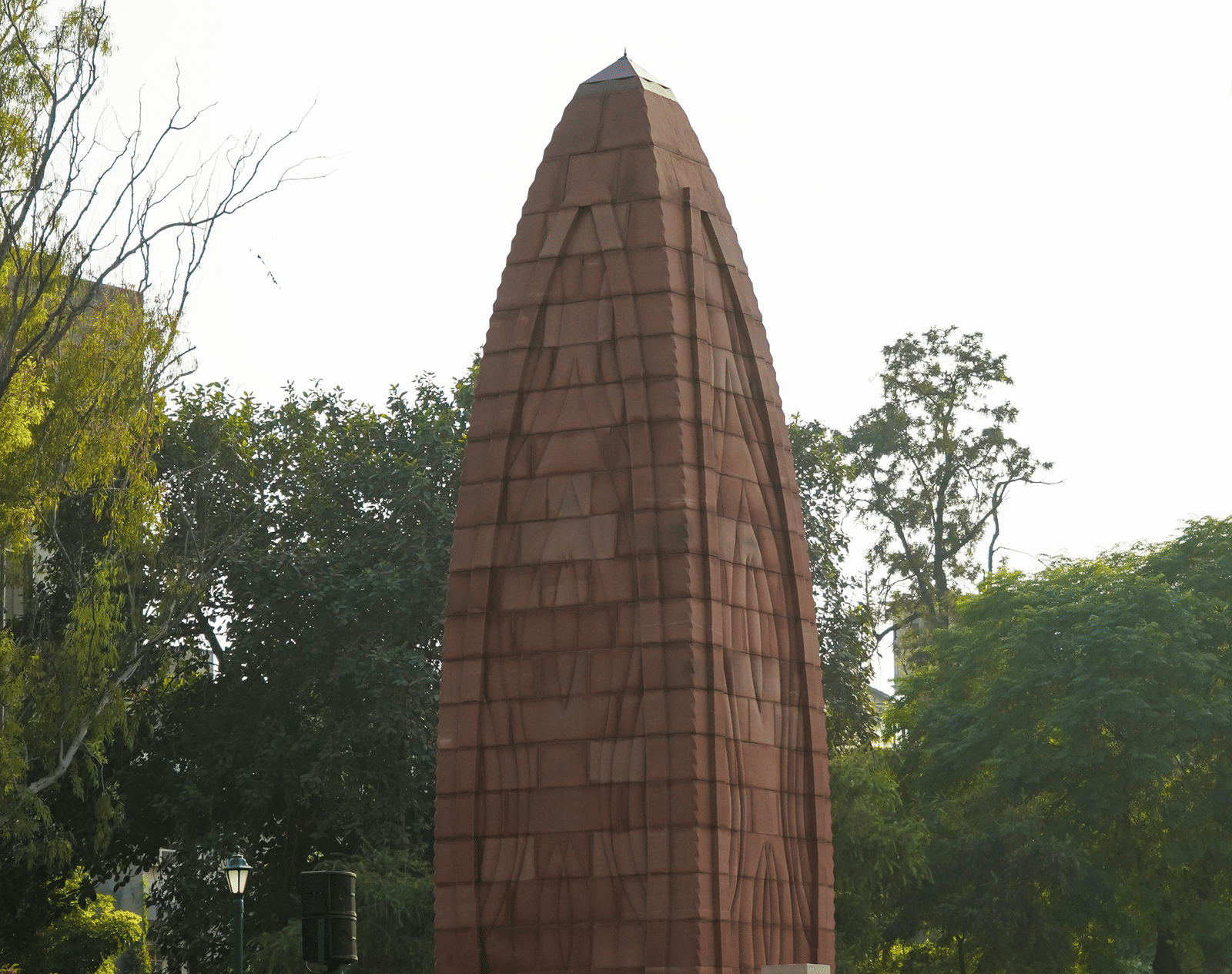 A shot of Jallianwala Bagh Memorial, featuring a crowd of tourists in front of it