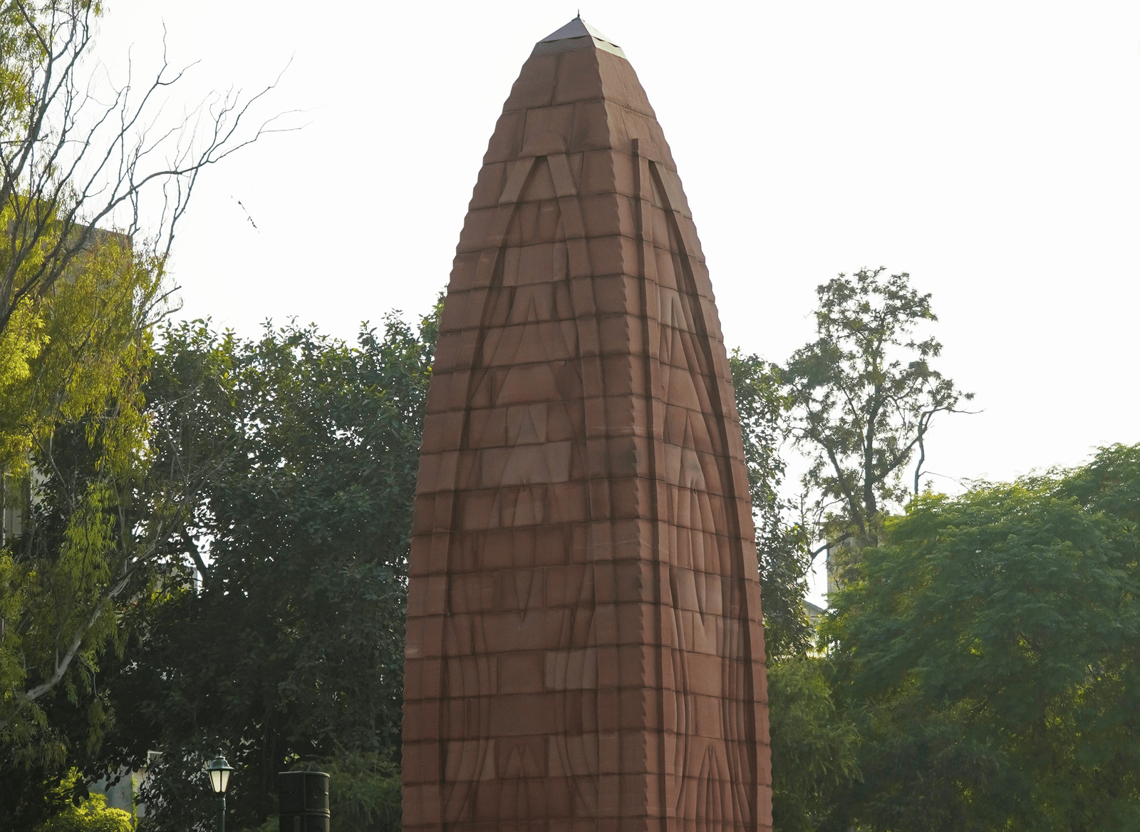 A shot of Jallianwala Bagh Memorial, featuring a crowd of tourists in front of it