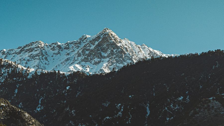 an overview of Dharamshala with the snow-capped himalayan mountains in view