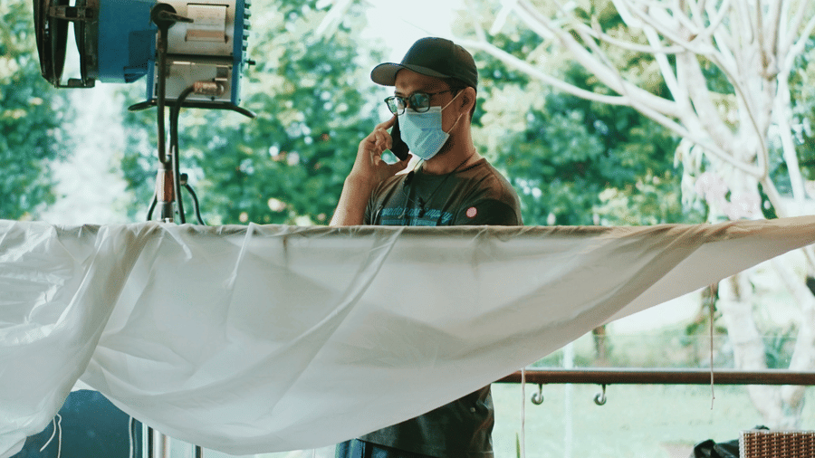 woman organising a brand shoot setup
