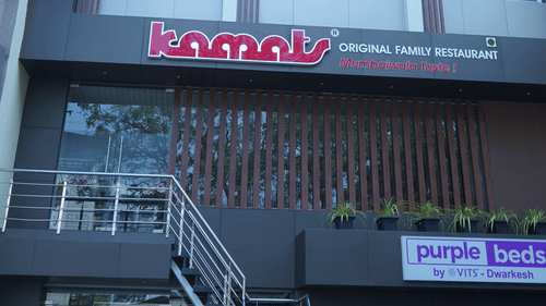 Bright lit Facade of Purple Beds by VITS, Surat