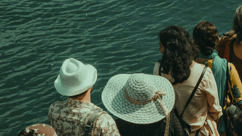 People standing in queue to view something in Baratang Island.