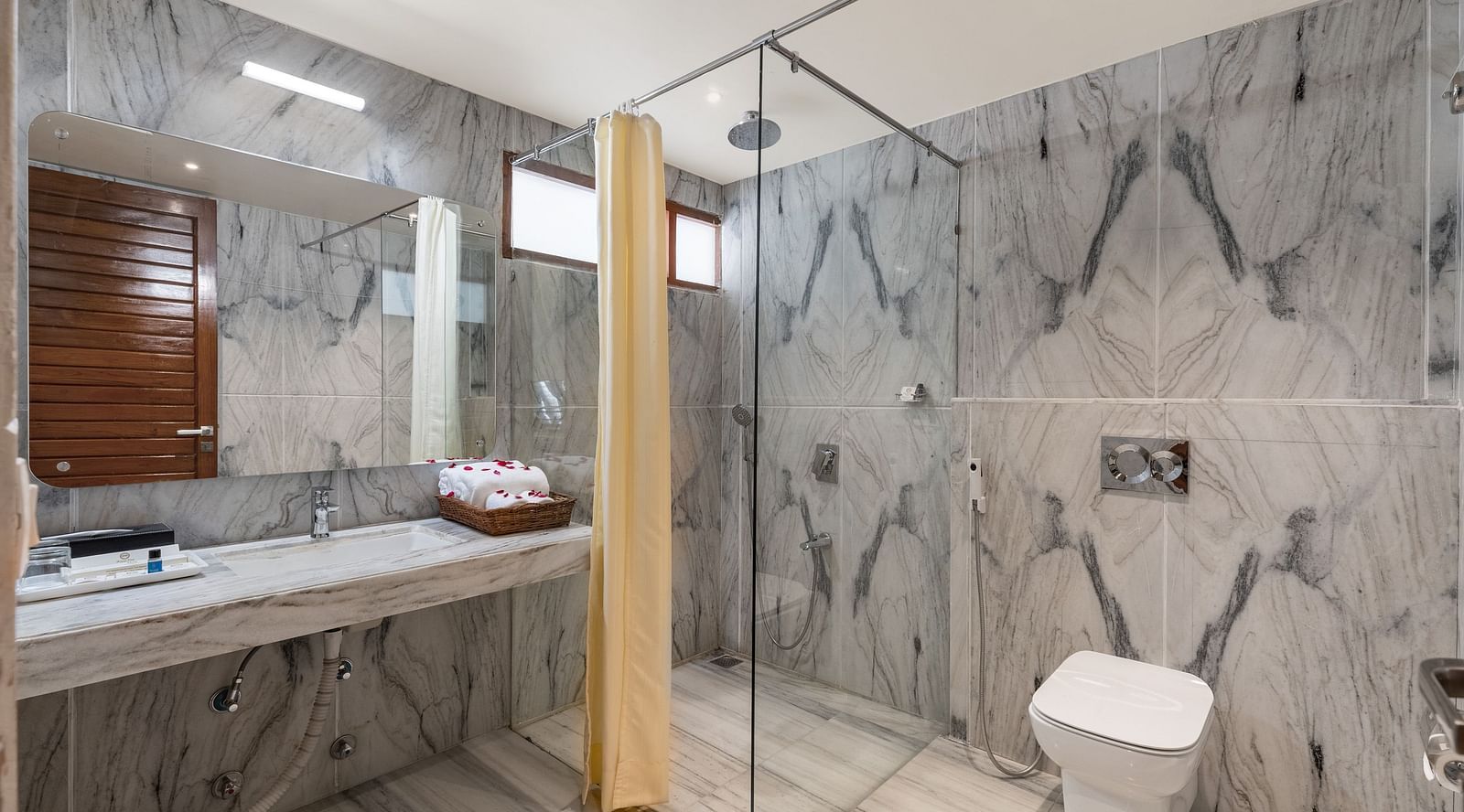 image of a well appointed bathroom at the luxury cottage room at aranya vilas