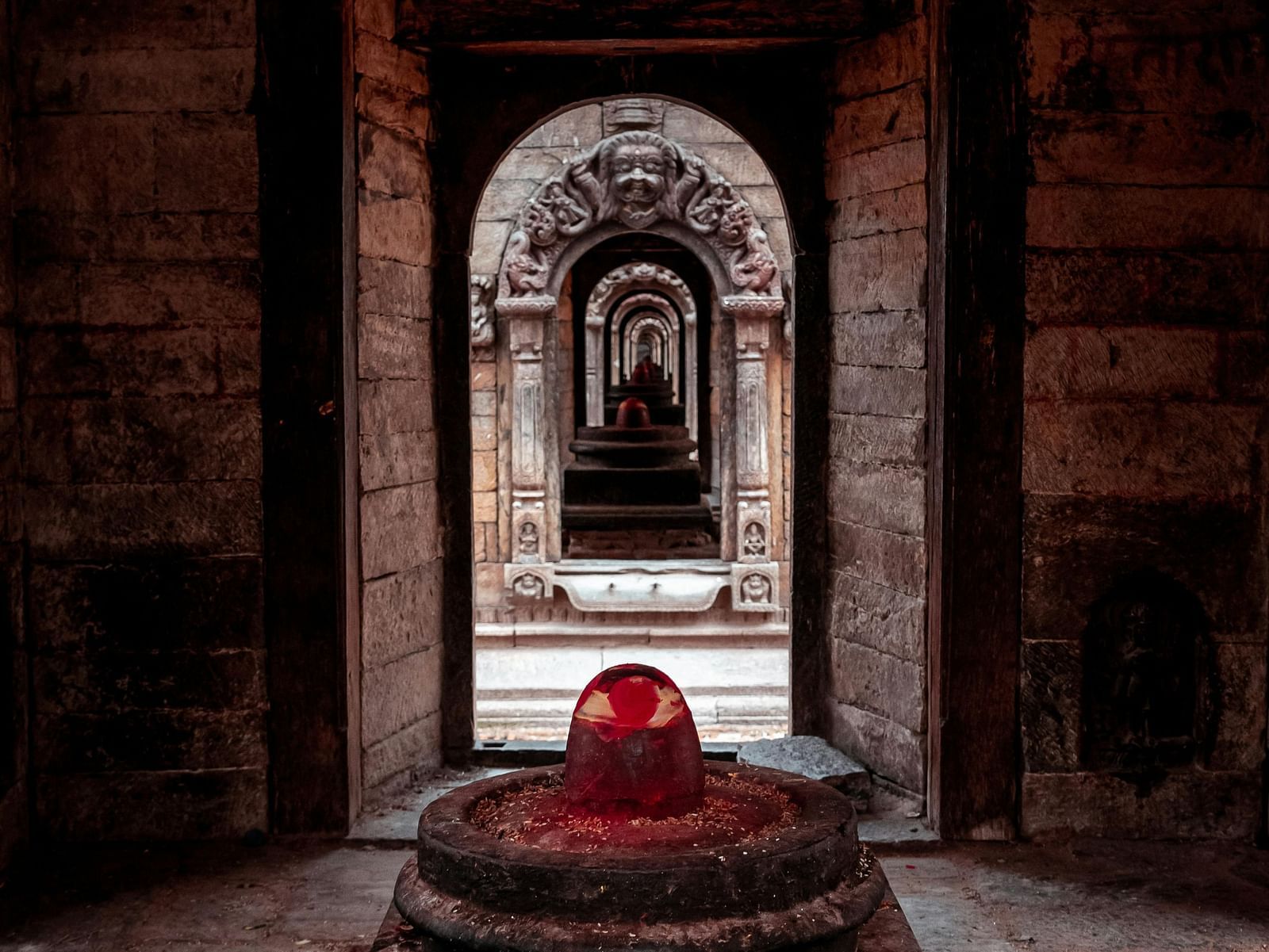 image of shivling craved on the stone.