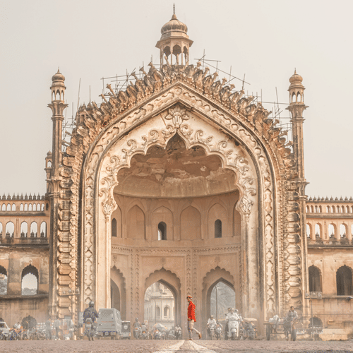 Front view of Bara Imambara in Lucknow, India, showing its grand arched gateway with detailed architecture